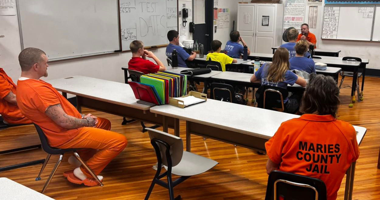 Students at Visitation Inter-Parish School in Vienna listen as inmates talk to them about what happened in their lives that led them to end up in the Maries County Jail.
